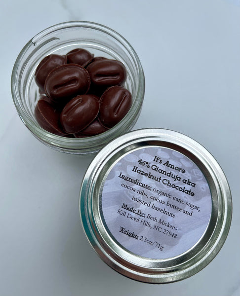 2.5 ounce jar of coffee bean shaped hazelnut chocolate 